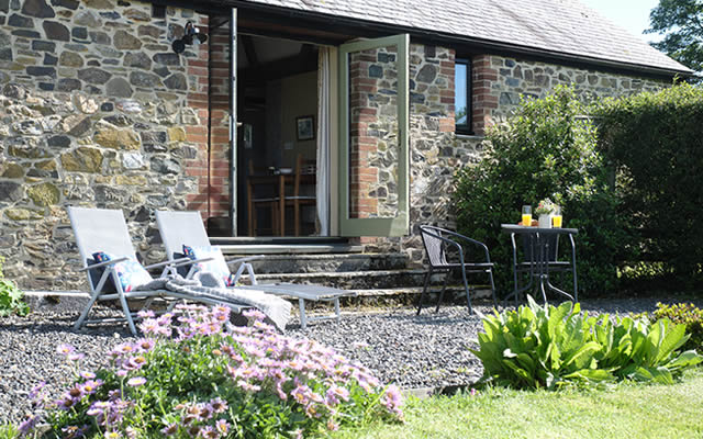 Monkstone Cottge - relax and enjoy the views in the private garden at Monkstone Cottage